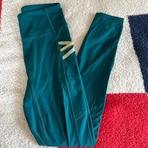 Fabletics Teal Leggings with Gold Accents